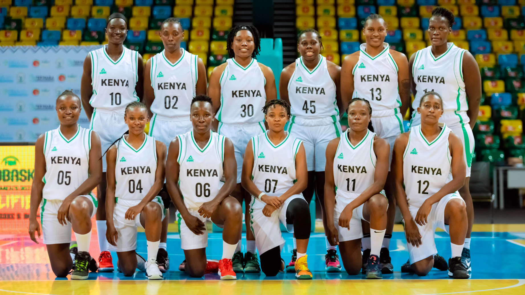 Kenya Lioness line up for a team photo during their FIBA Women's Afrobasket qualifiers match against Rwanda in the Kigali Arena in Kigali Rwanda on July 13, 2021.
